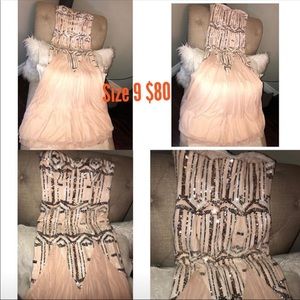 Long prom blush colored with silver decals dress!